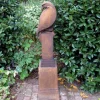 Eagle on Pedestal Modern Stone Garden Statue (Rust)